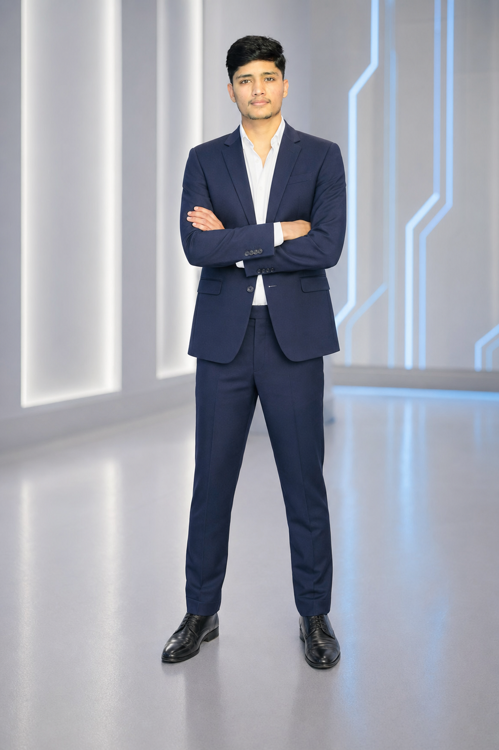 Abhay Sharma in a professional blue suit